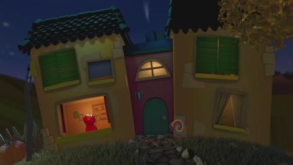 Elmo schaut aus dem Gute-Nacht-Haus. | Rechte: KiKA