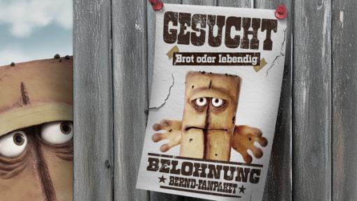 Geburtstagsbernd | Rechte: KiKA „Gesucht“-Plakat mit Bernd das Brot, der besorgt hinter einem Holzzaun hervorschaut.