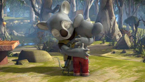 Blinky umarmt seinen Vater, der überraschend von seiner Reise zurückgekehrt ist.<br/> | Rechte: KiKA/Studio 100 Media / Flying Bark