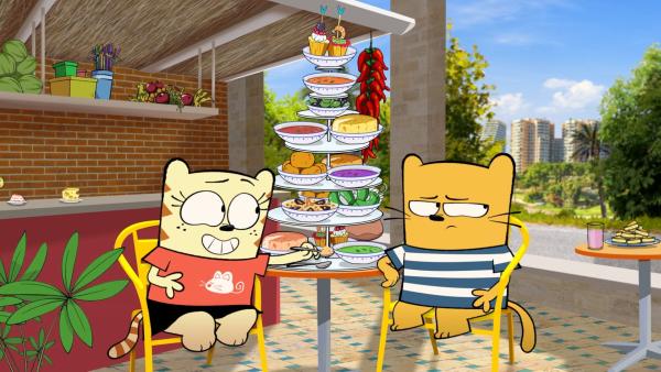 Ollie und Moon essen Tapas.