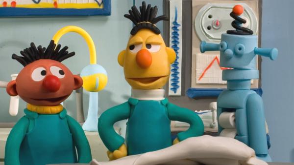 Ernie und Bert haben einen Roboter erfunden, der alles macht, was man ihnen sagt. | Rechte: NDR/Sesameworkshop