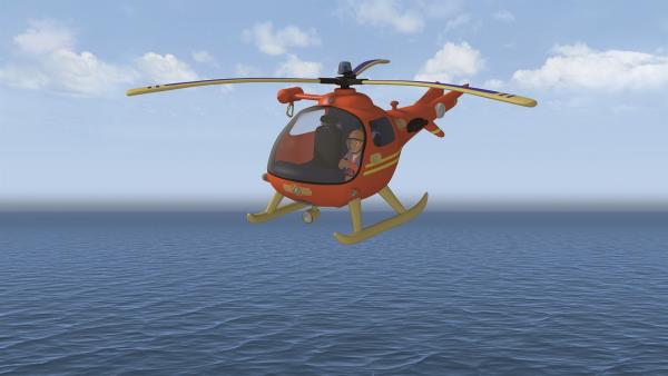 Tom Thomas fliegt in Wallaby 1 über den Strand von Pontypandy. | Rechte: KiKA/Prism Art & Design Limited