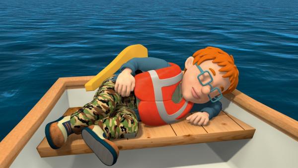 Das Ruderboot treibt aufs offene Meer hinaus, während Norman und James schlafen. | Rechte: KiKA/HIT Entertainment