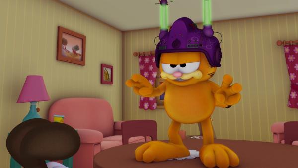 Garfield hat ein Waffeleisen bestellt, geliefert bekommt er aber einen Helm, mit dem man die Gedanken anderer Wesen hören kann. | Rechte: HR/DARGAUD MEDIA