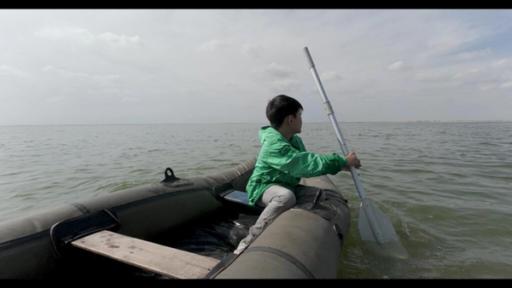 Foto: Bagnaa mit einem Boot auf dem See