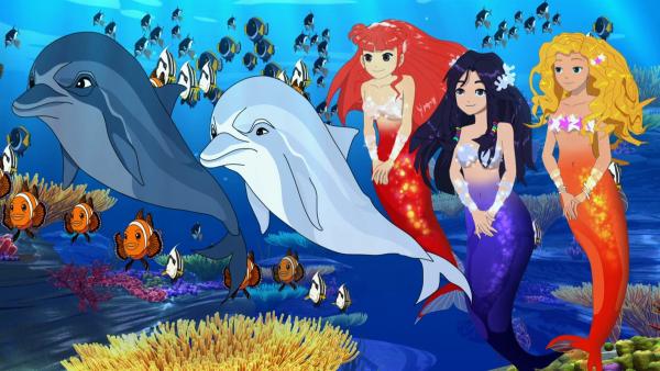 Die Meerjungfrauen Rikki, Cleo und Emma (v.l.n.r.) lauschen gemeinsam mit ihren Unterwasserfreunden dem Gesang von Carlotta. | Rechte: ZDF/Les Cartooneurs Associés