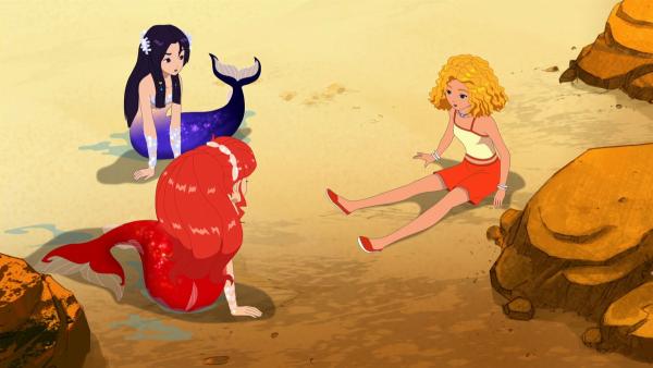 Emma ist unter Wasser mit einer geheimnisvollen Alge in Berührung gekommen. Seitdem verwandelt sie sich nicht mehr in eine Meerjungfrau wie ihre Freundinnen Cleo und Rikki. | Rechte: ZDF/Les Cartooneurs Associés