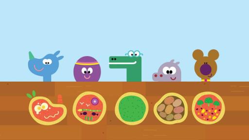 Duggee hat einen Pizzaofen und die Quirlies dürfen ihre Pizza so belegen, wie es ihnen am besten schmeckt.