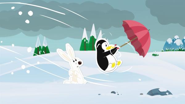 Pinguindame Lissy hat sich von Inui wegen des schlechten Wetters einen Schirm geliehen. Der Sturm bläst sie damit aber wie wild durch die Gegend. Loslassen kommt für sie bei etwas Geliehenem nicht in Frage. | Rechte: ZDF und JEP-Animation GmbH