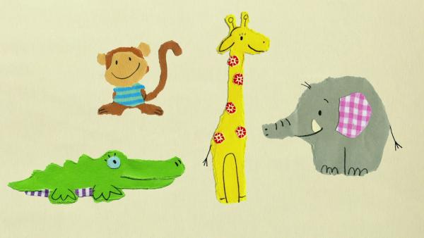 ein Affe, ein Krokodil, eine Elefant und eine Giraffe