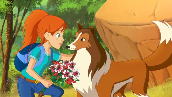 Zoe freut sich, dass Hündin Lassie einen weiteren Weg in den "geheimen" Garten gefunden hat. | Rechte: ZDF/Classic Media/DC Entertainment/Superprod