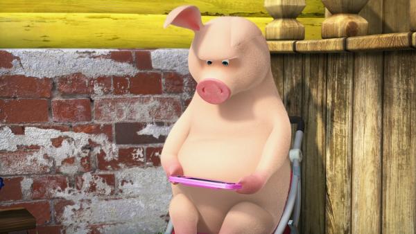 Das Schwein beim Konsolenspiel.  | Rechte: KiKA/Animaccord LTD