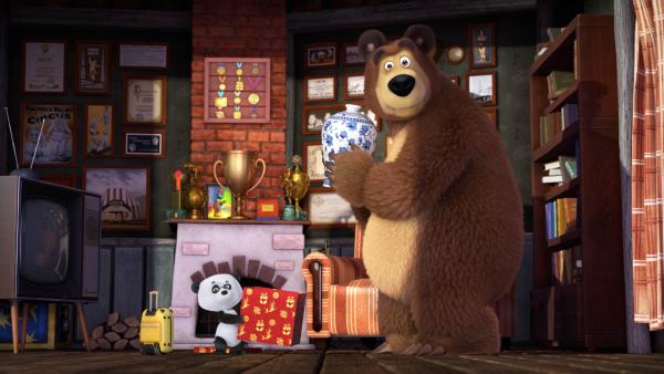 Der Bär hält eine Vase in den Händen. | Rechte: KiKA/Animaccord Animation Studio