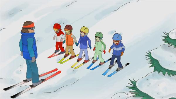 Alex ist Connis Skilehrer, geduldig erklärt er Conni und den anderen Kindern, wie sie bremsen sollen. | Rechte: ZDF/Henning Windelband/Youngfilms GmbH