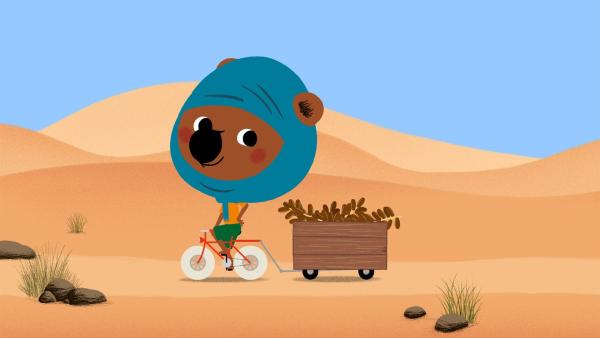 Mouk mit seinem Fahrrad in der Sahara | Rechte: KiKA/Millimages