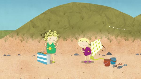 Nele und Nora sind heute mit Noras Drachen am Strand. | Rechte: KiKA/Geronimo Productions