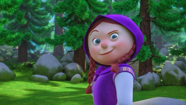 Das rothaarige Mädchen mit lila Kleidung und lila Käppchen heißt Lilakäppchen. Sie hebt eine Augenbraue und lächelt. | Rechte:  © 2021 - Method Animation - Palomar - ZDF - ZDF Enterprises