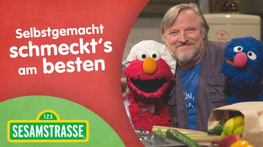 Axel Prahl mit Elmo und Grobi