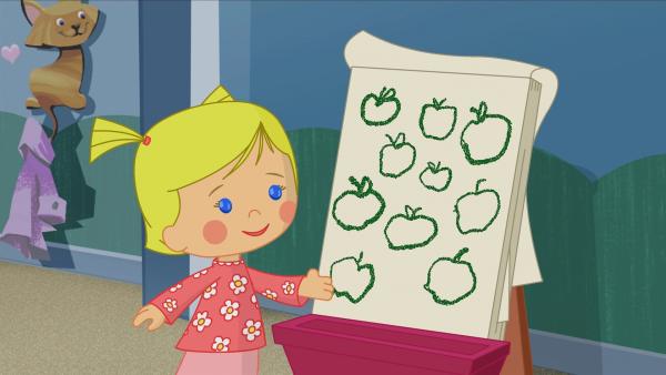 Zoé spielt mit ihren Freunden Schule. Sie sollen heute die Äpfel auf ihrer Tafel zählen. | Rechte: KiKA/Mike Young Productions